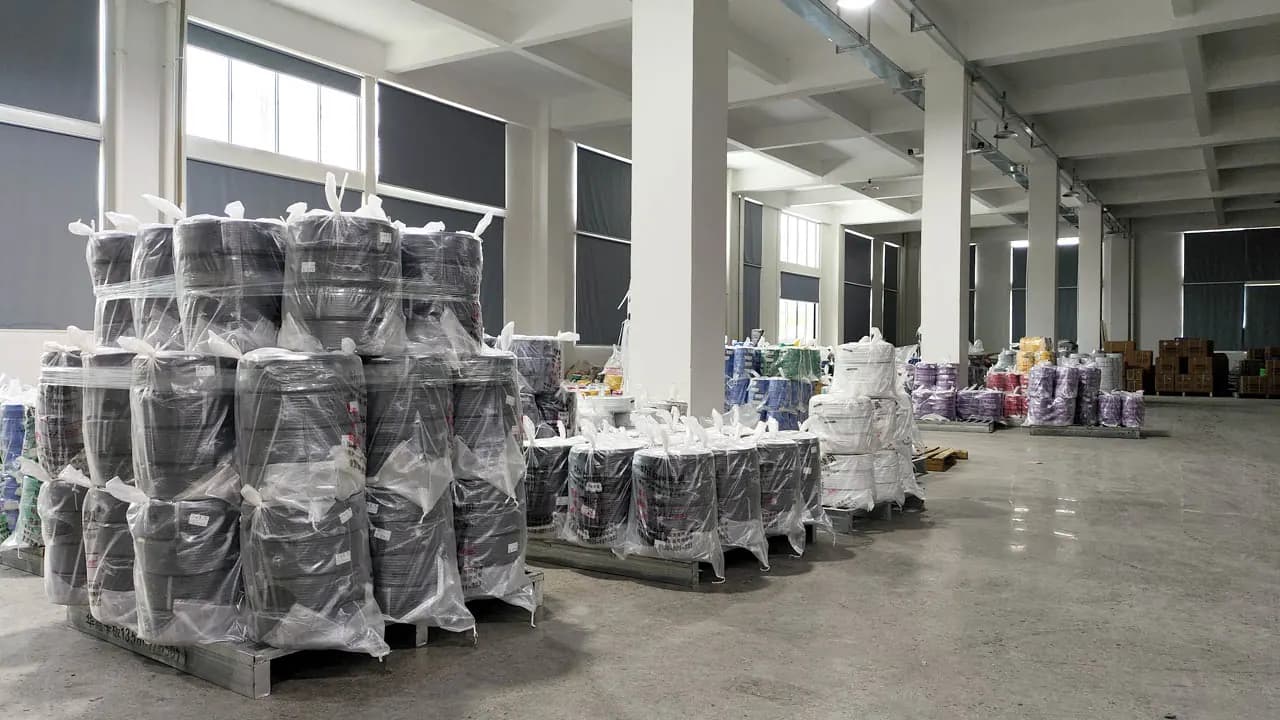 Rows of finished cable reels wrapped for dispatch