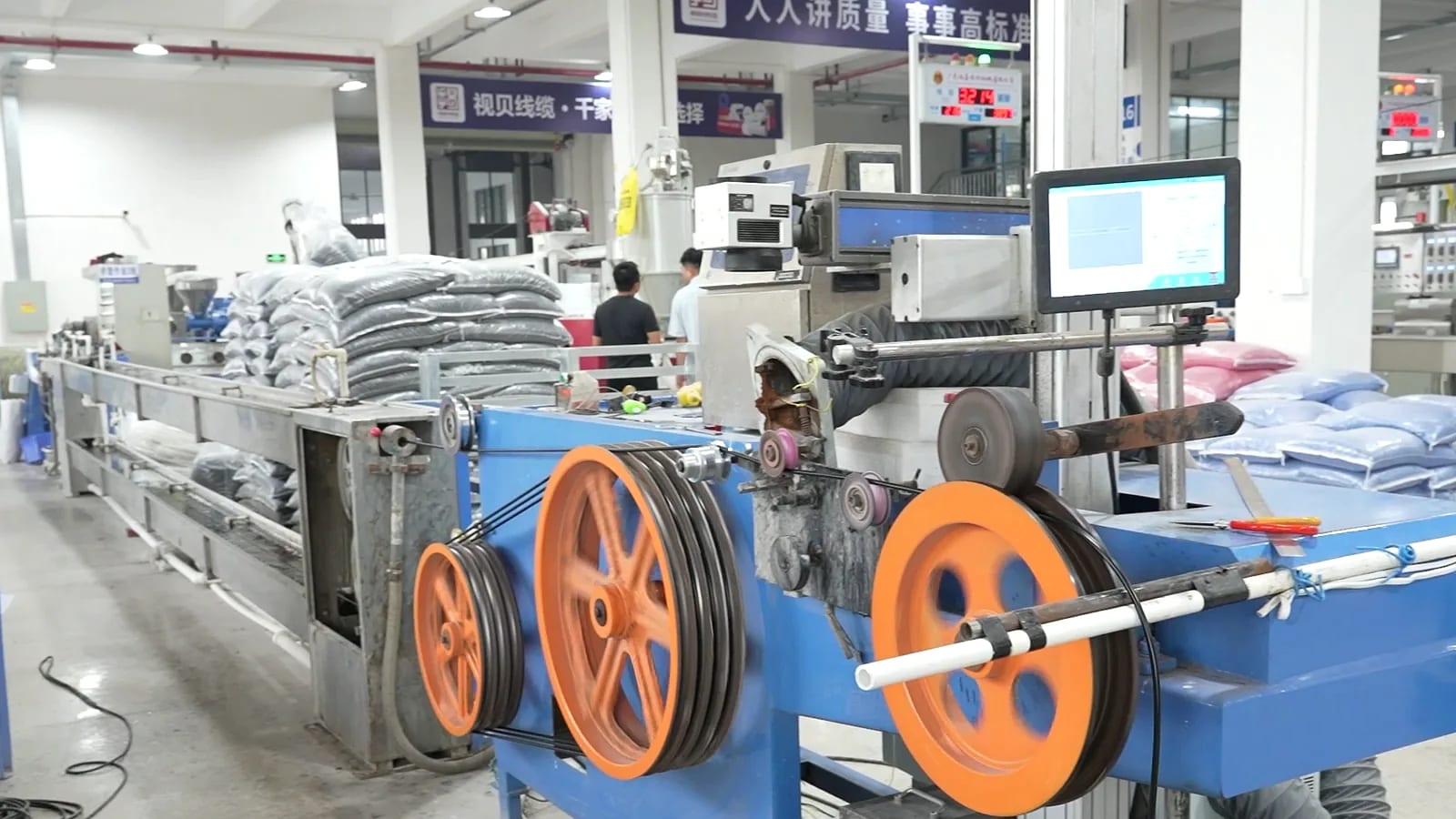 Cable production equipment operating inside the factory