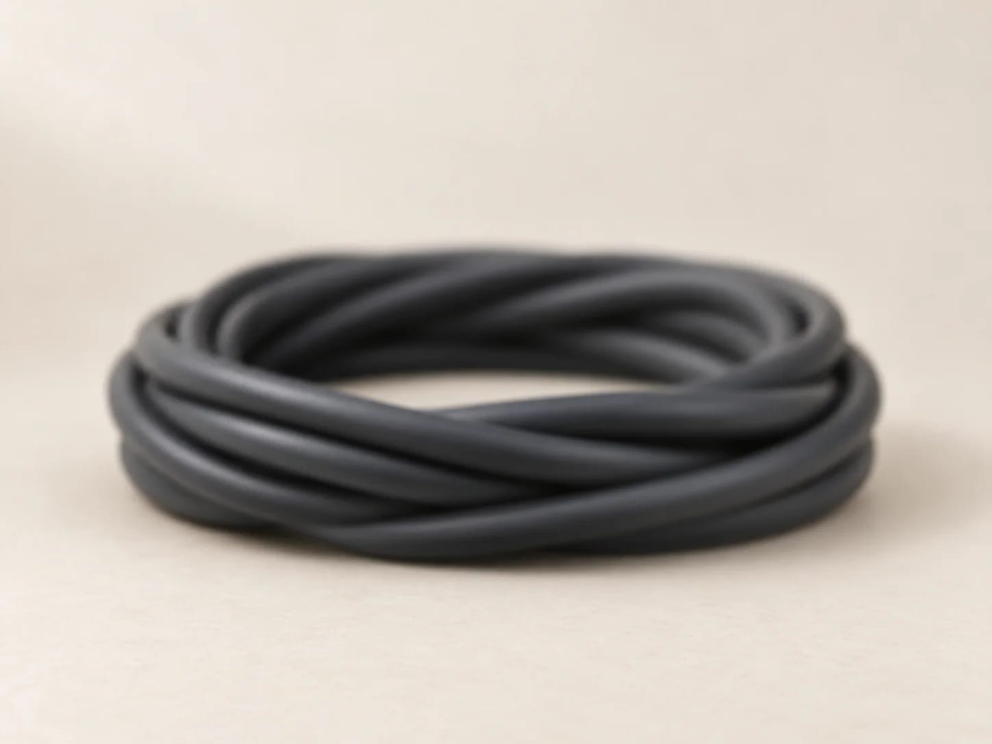 A loose coil of twisted wire on a plain surface. Orientation image; verified values are on each product record.